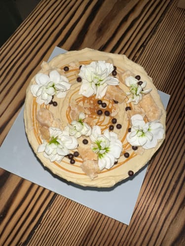 Customer photo review of chocolate caramel cake