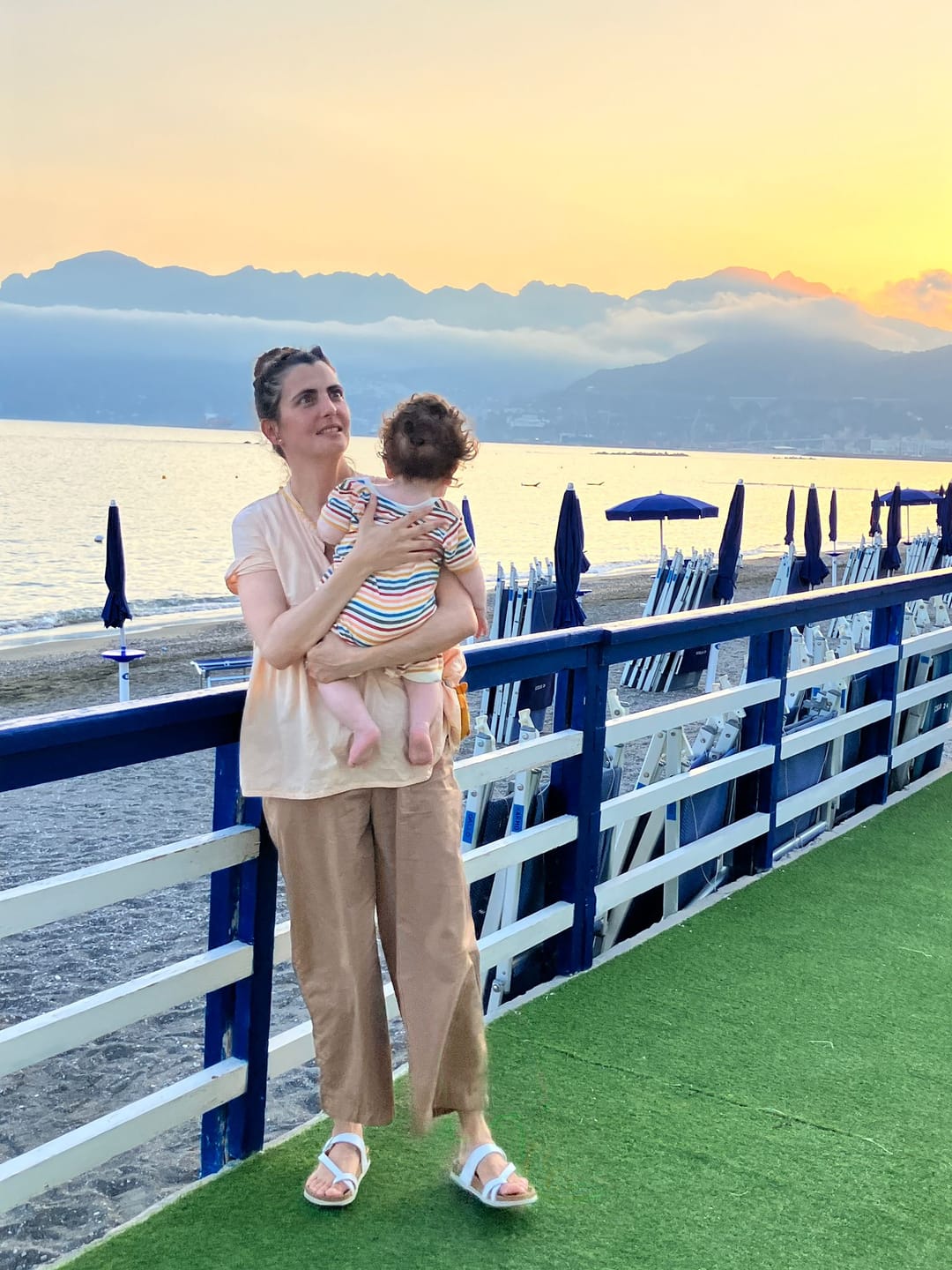Customer photo review of Cream Rainbow Organic Romper