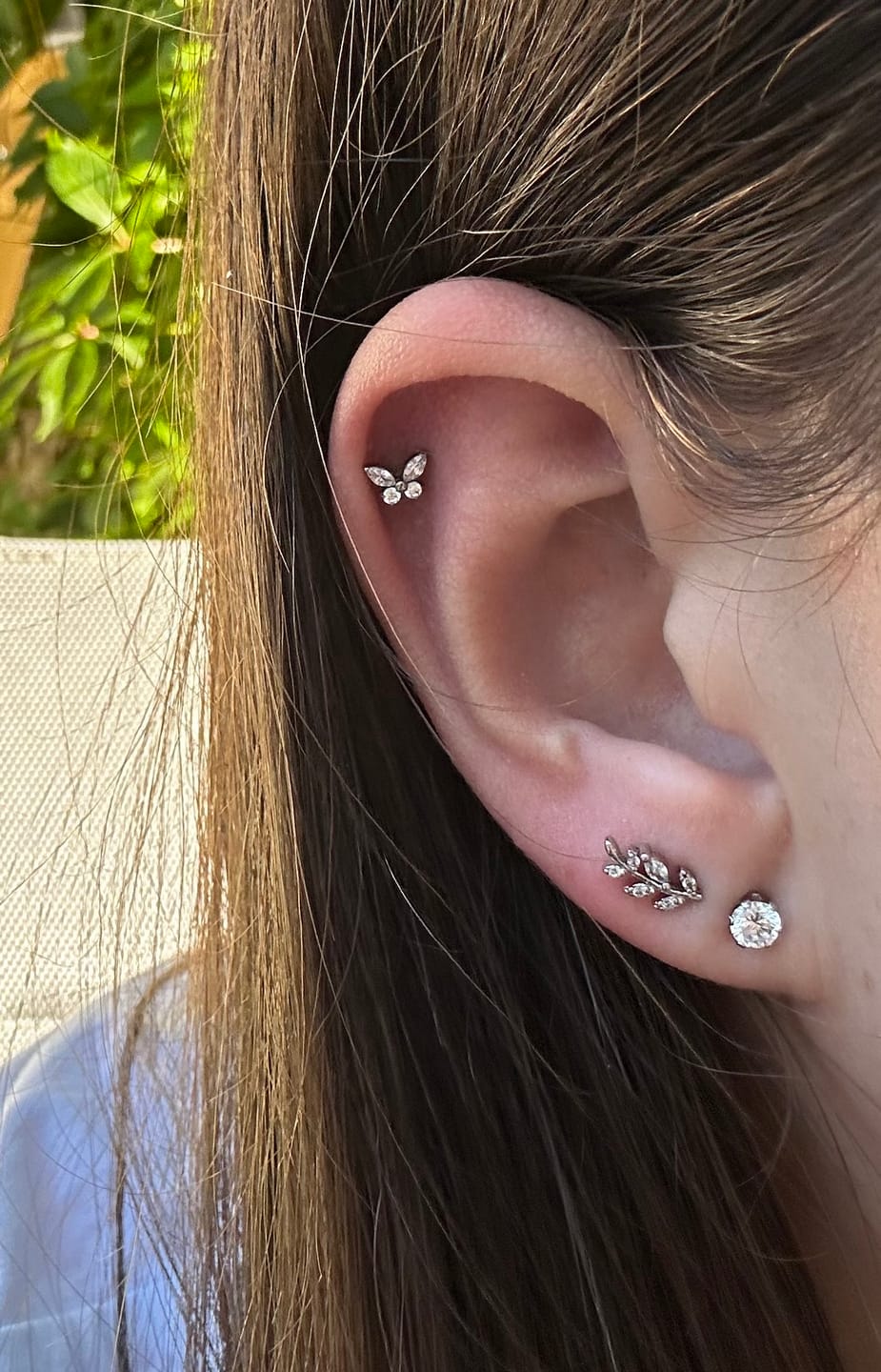 Customer photo review of Butterfly Piercing | Titan