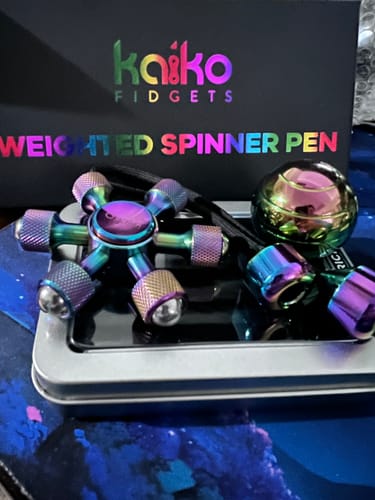Customer photo review of BLACK Weighted Spinner Pen with 4 refills