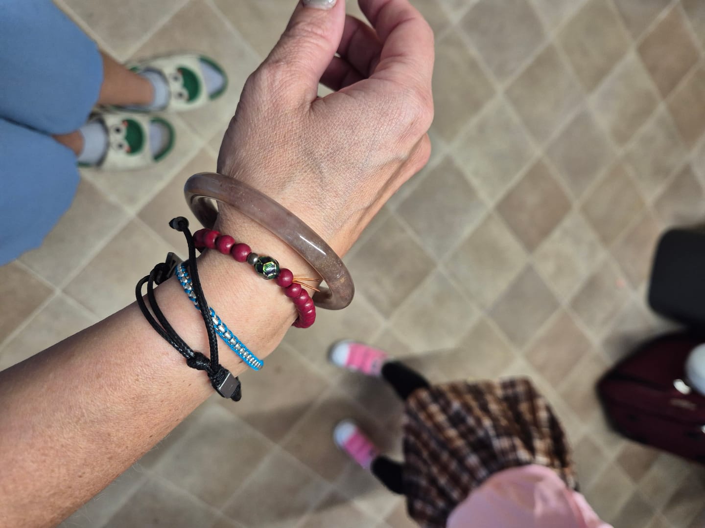 Customer photo review of Buddha Stones Purple Jade Happiness Protection Bracelet Bangle