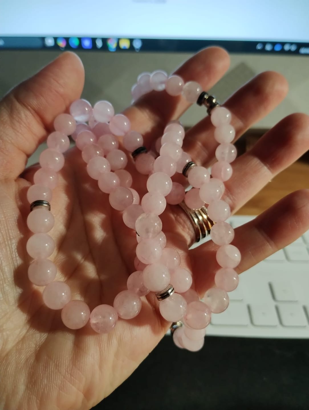 Customer photo review of Buddha Stones 108 Mala Beads Natural Stone Rose Quartz Lotus Peace Bracelet
