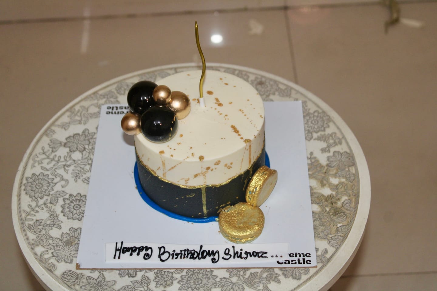 Customer photo review of Gold Splash Blue Cake