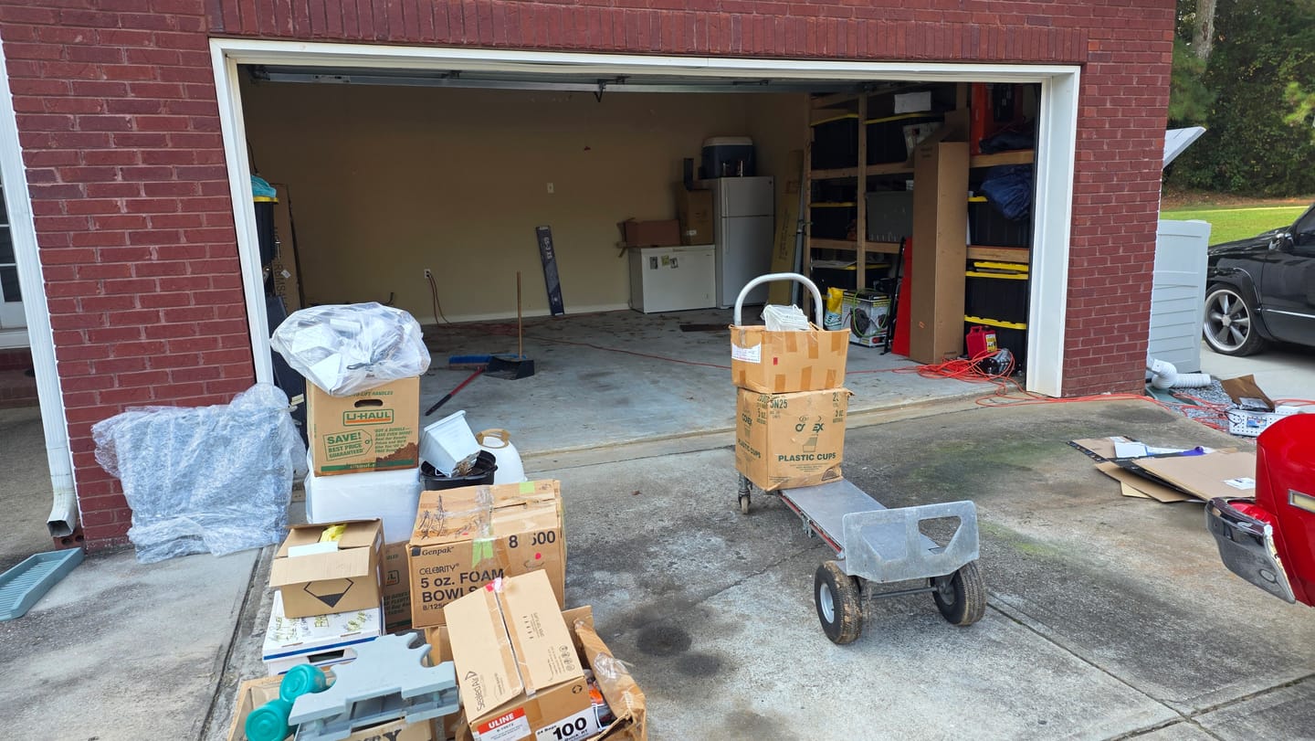 Customer photo review of Reibii 4-Tier 2650LBS Heavy Duty Industrial Garage Shelving Units,60" W Adjustable Metal Storage Shelves Racks for Garage, Warehouse, Basement