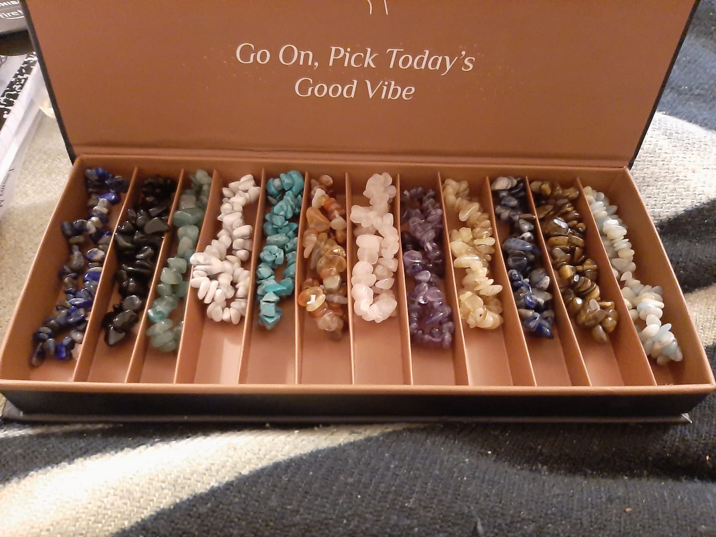 Customer photo review of 12 Natural Crystal Bracelets + Box