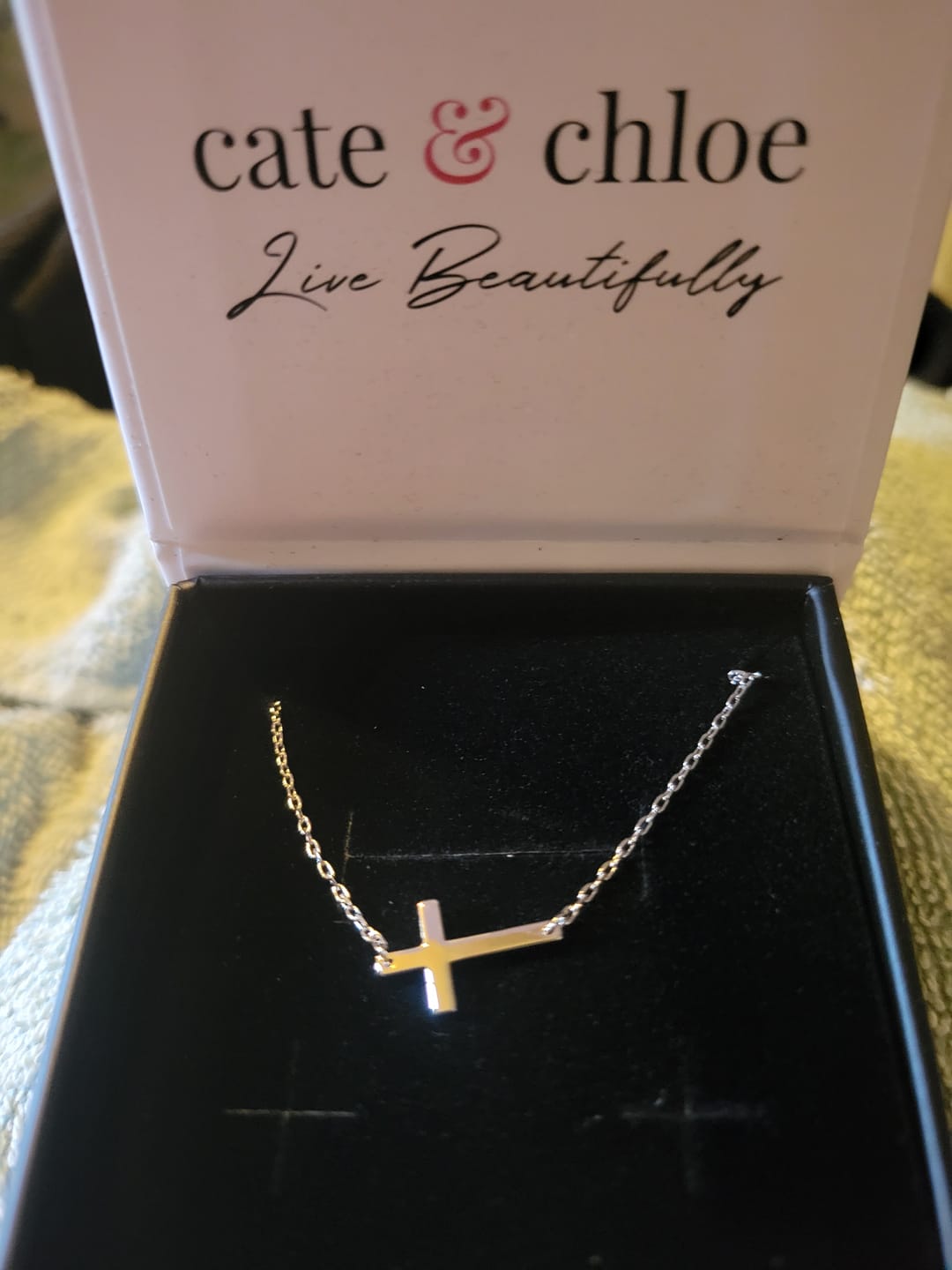 Customer photo review of Nancy 18k White Gold Plated Cross Pendant Necklace