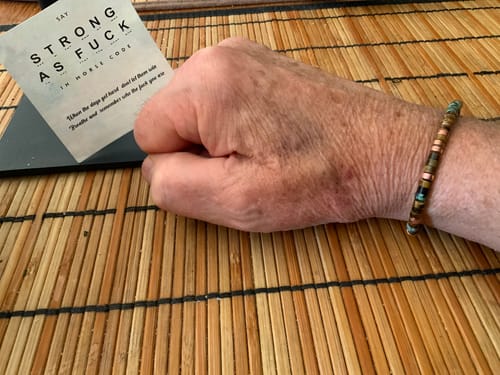 Customer photo review of 'No One Fights Alone' Morse code Bracelet