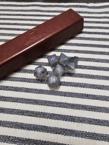 Customer photo review of Black Inked Lightning Cracked Glass DND Dice Set