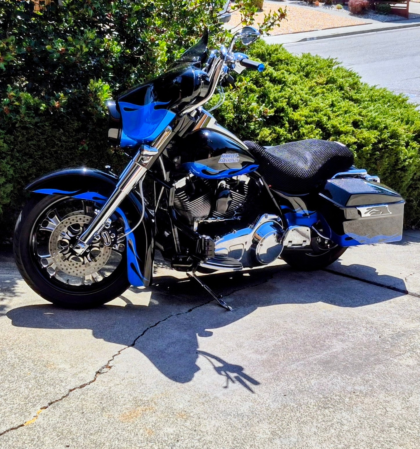 Wind Rider mesh seat cover installed on a Harley Street Glide parked outdoors