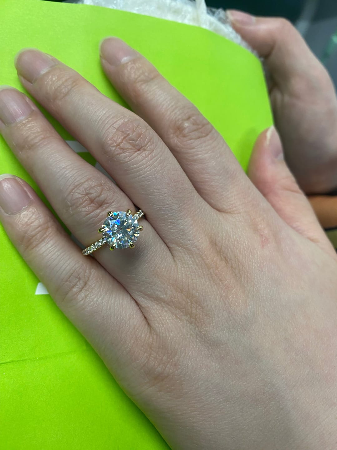Customer photo review of Rodiffy Moissanite 2.0 Ct ~4.0 Ct Round Cut 6 Prong Yellow Gold Promise Ring