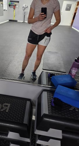 Customer photo review of 'Child of God' Women's Performance Shorts