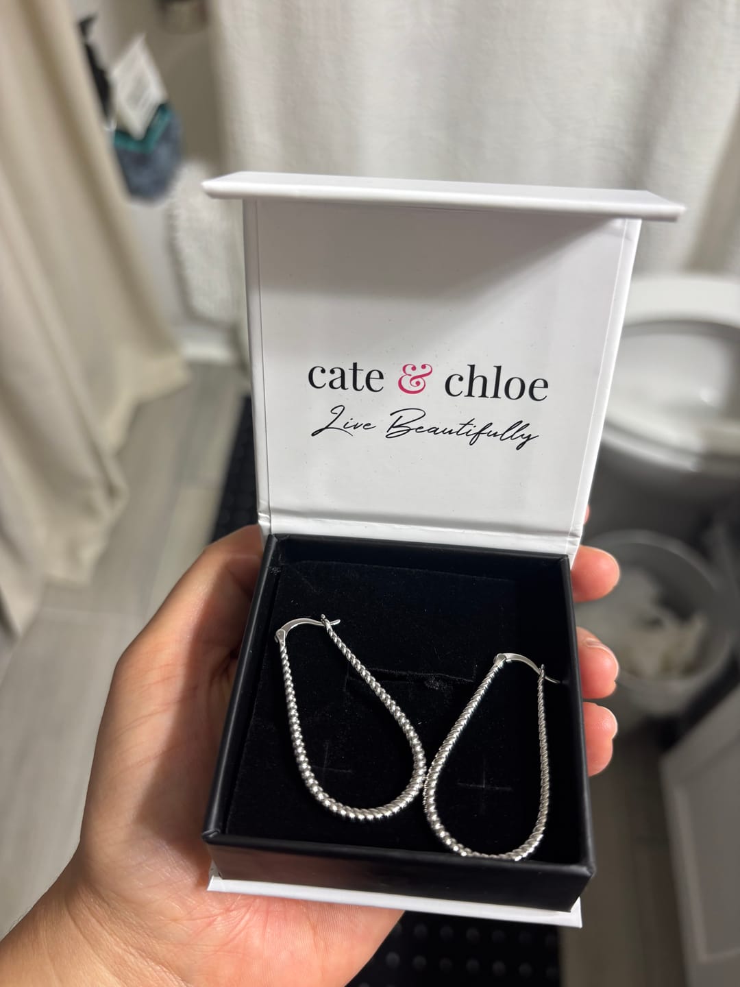 Customer photo review of Angelica 18k White Gold Plated 45mm Twisted U-Shaped Hoop Earrings