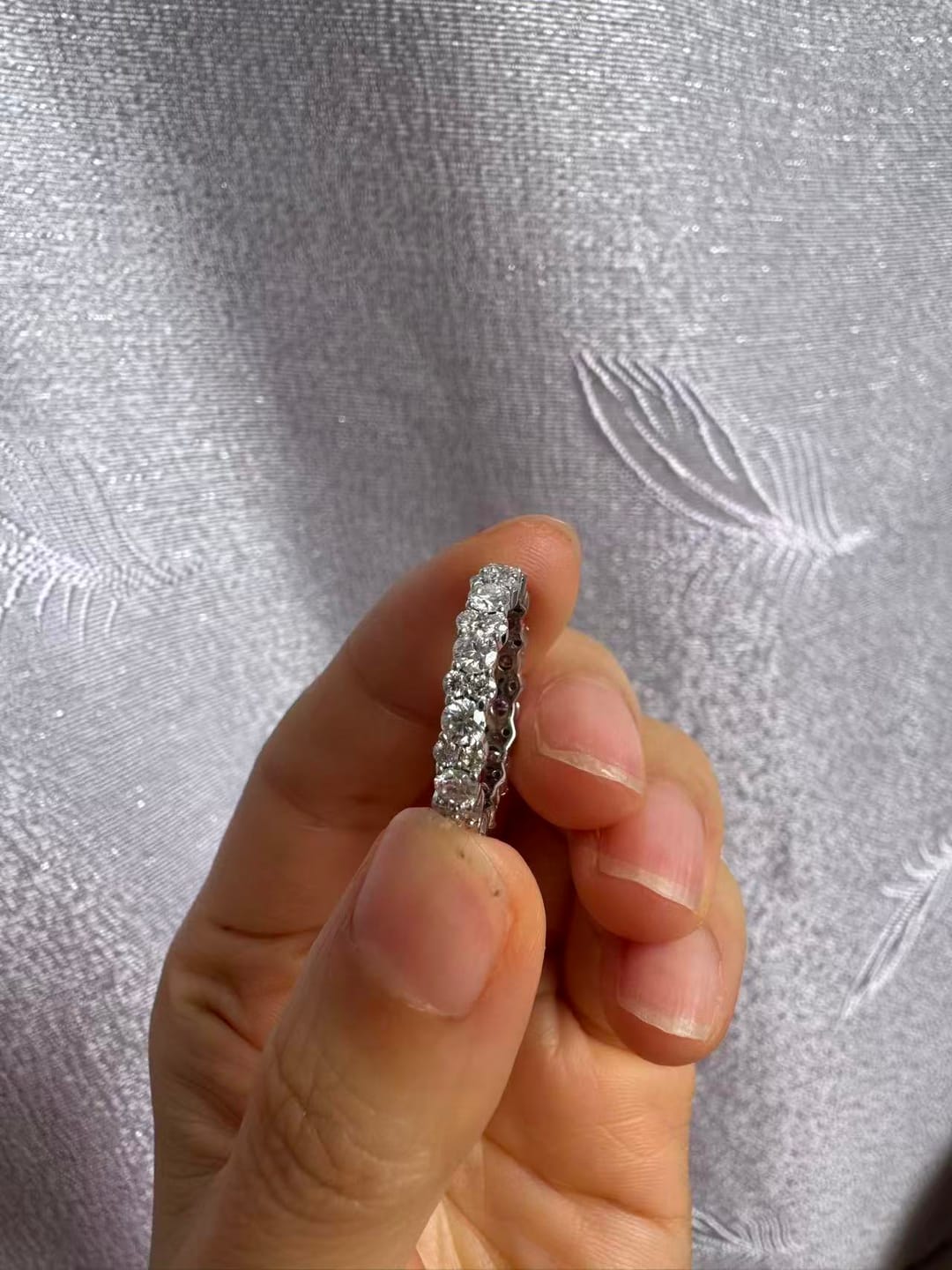 Customer photo review of S925 Moissanite 2.5 Ct Round Cut Full White/Green Stone Wedding Band for Women