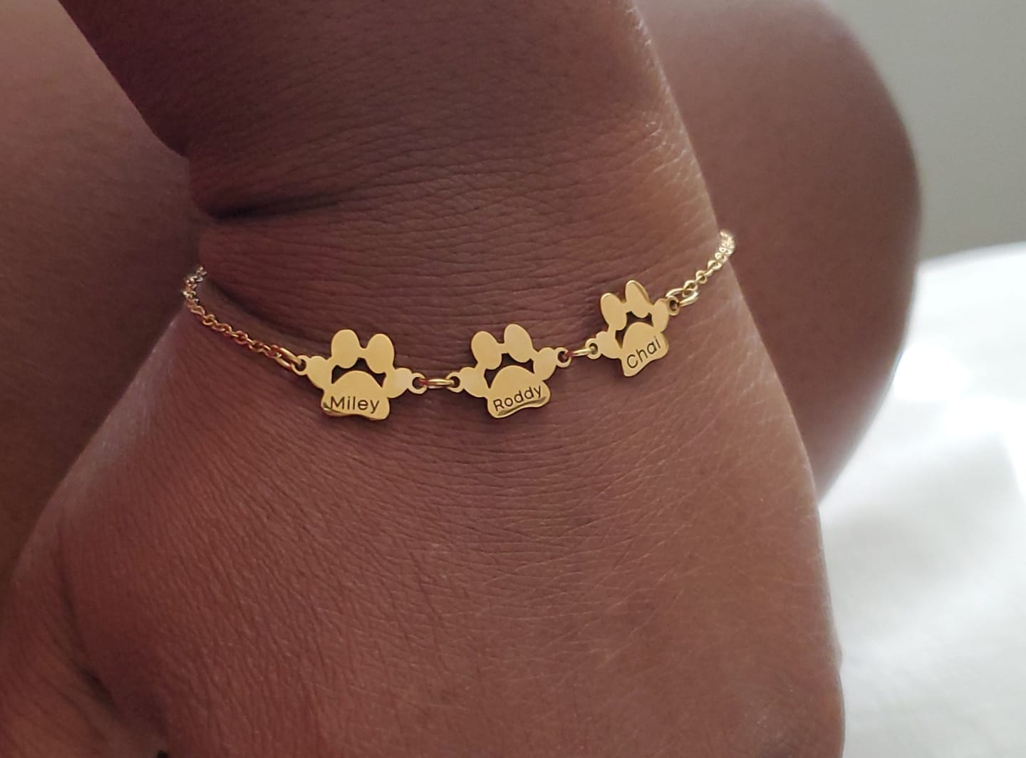Customer photo review of Custom Paw Name Bracelet