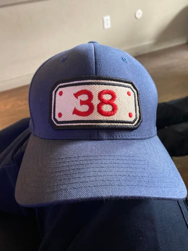 Customer photo review of FLEXFIT HOSE HAT WITH CUSTOM BACK OF HAT