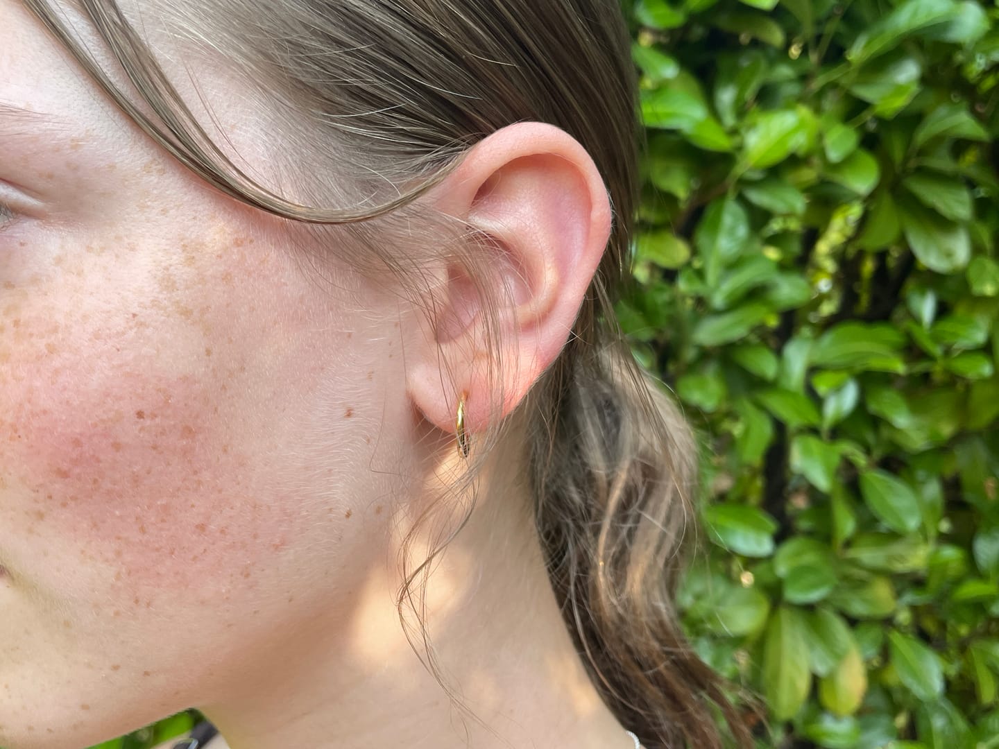 Customer photo review of Tiny Hoop Clip On Earrings in Gold
