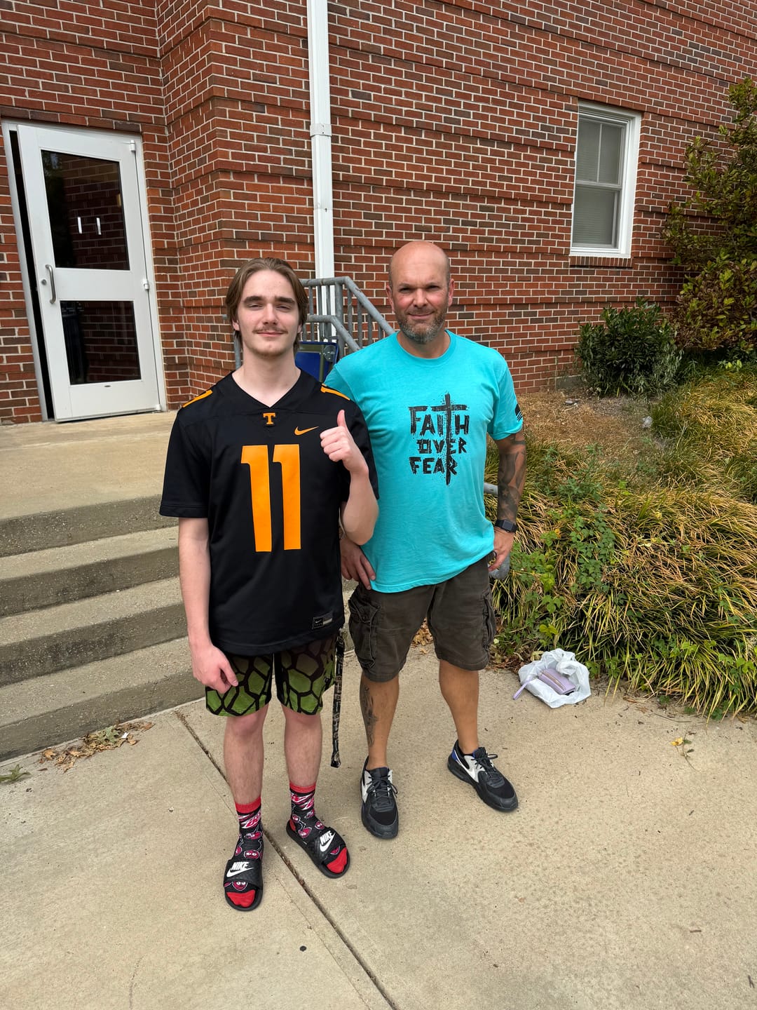 Customer photo review of Faith Over Fear Tee
