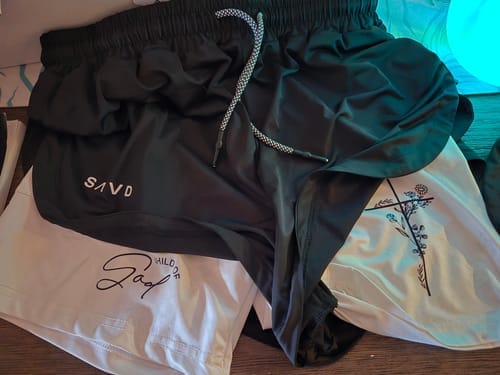Customer photo review of 'Child of God' Women's Performance Shorts