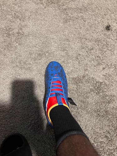 Customer photo review of Superman Football Cleats - Quantum Speed by Phenom Elite