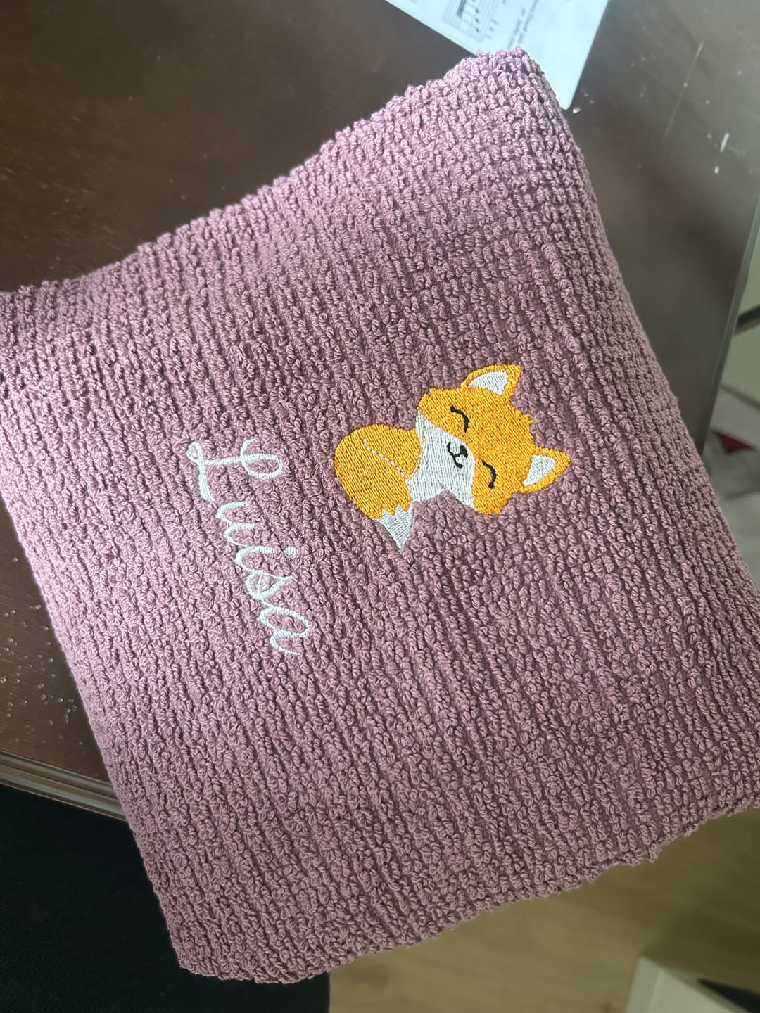 Customer photo review of BIO Badeponcho DELUXE mit Namen bestickt mauve Lamas