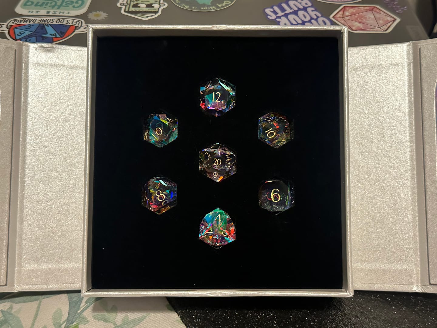 Customer photo review of URWizards D&D Multi-faceted Prism Glass Engraved Dice Set