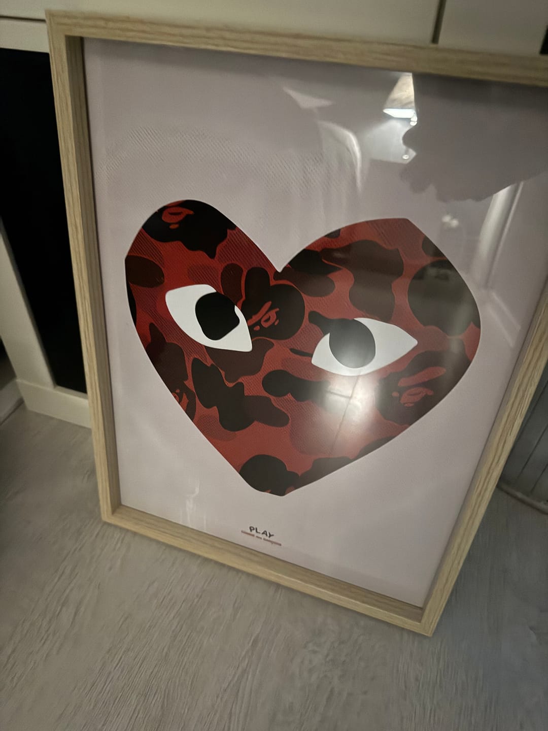 Customer photo review of Cadre photo Comme Des Garçons coeur rouge