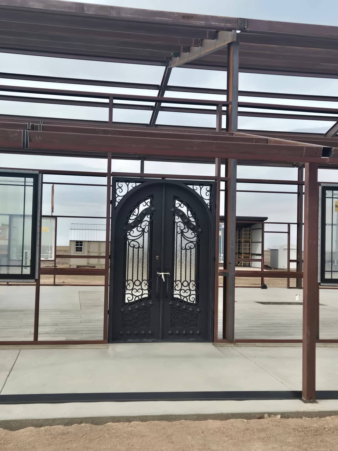 Customer photo review of Canton Model Double Front Entry Iron Door With Tempered Rain Glass Dark Bronze Finish