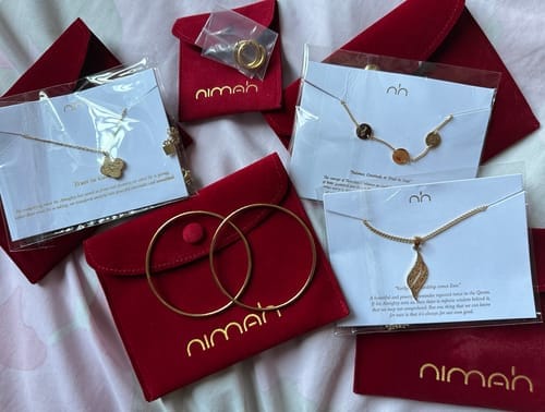 Customer photo review of Hardship & Ease Necklace