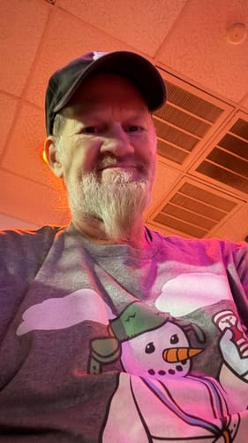 Customer wearing the grey Cousin Eddie Snowman Christmas Vacation T-Shirt.