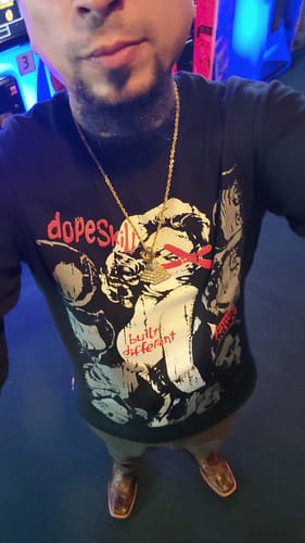 Customer wearing the black DopeSkill long sleeve t-shirt with the 'Built Different' graphic.