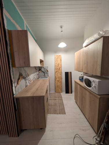 Customer photo review of Panneau Mural PVC Marbre Qatar – Veiné doré, Facile a Poser