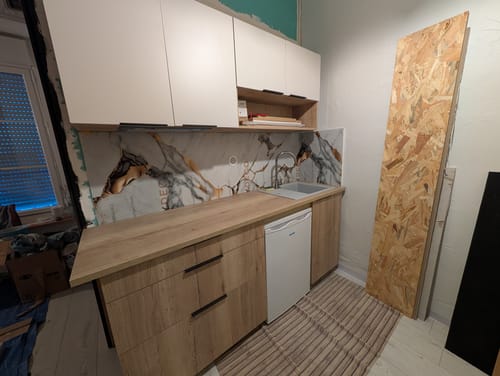 Customer photo review of Panneau Mural PVC Marbre Qatar – Veiné doré, Facile a Poser