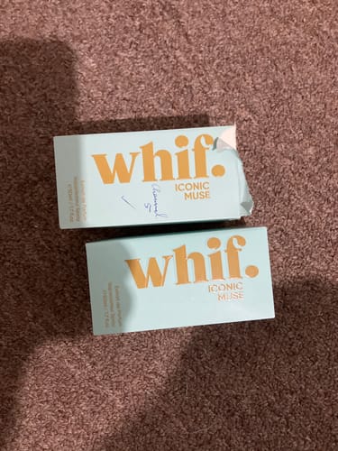 Customer's two boxes of Iconic Muse fragrance. One has 'Channel 5' handwritten on it for comparison.