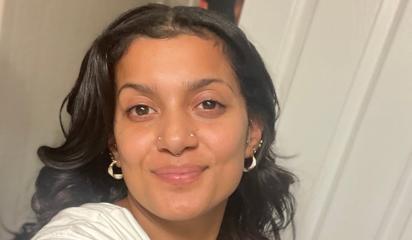 Customer photo review of Mother of Pearl Twist Hoop Earrings
