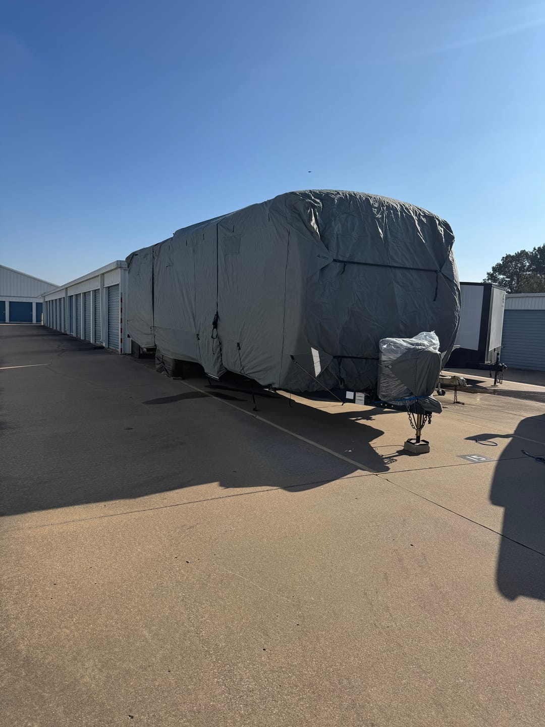 Customer photo review of Upgraded Easy Setup RV Cover Extra Thick 5 Layers Travel Trailer Cover Camper Cover with Assist Poles