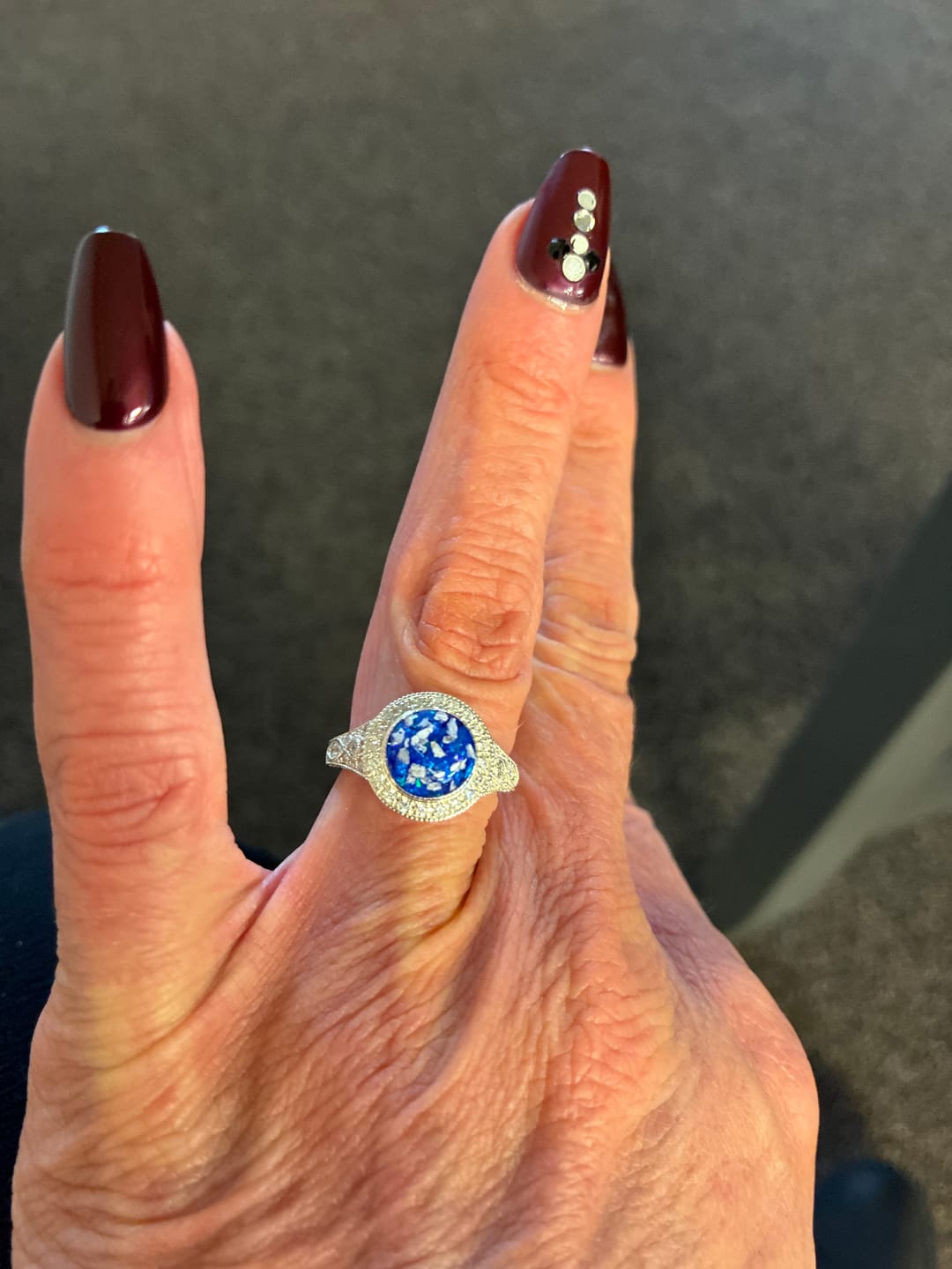 Customer photo review of Bedazzled Filigree Circle Opal Cremation Ring