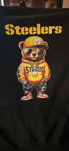 Customer's black sweatshirt with a detailed 'Steelers' bear graphic made using the DTF Super Soft Powder.