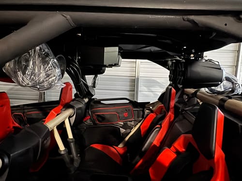 Customer's NSUB and speaker system during installation in their UTV, viewed from the side.