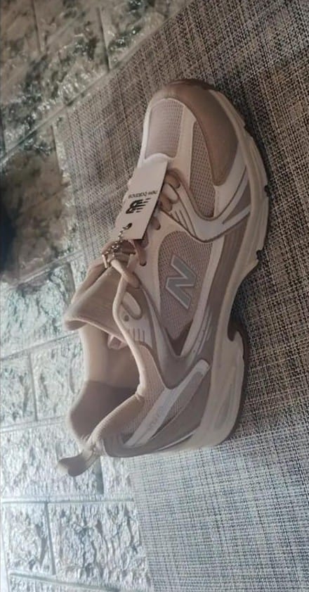 Customer photo review of Tenis New Balance 530 Ostion 1.1 Premium