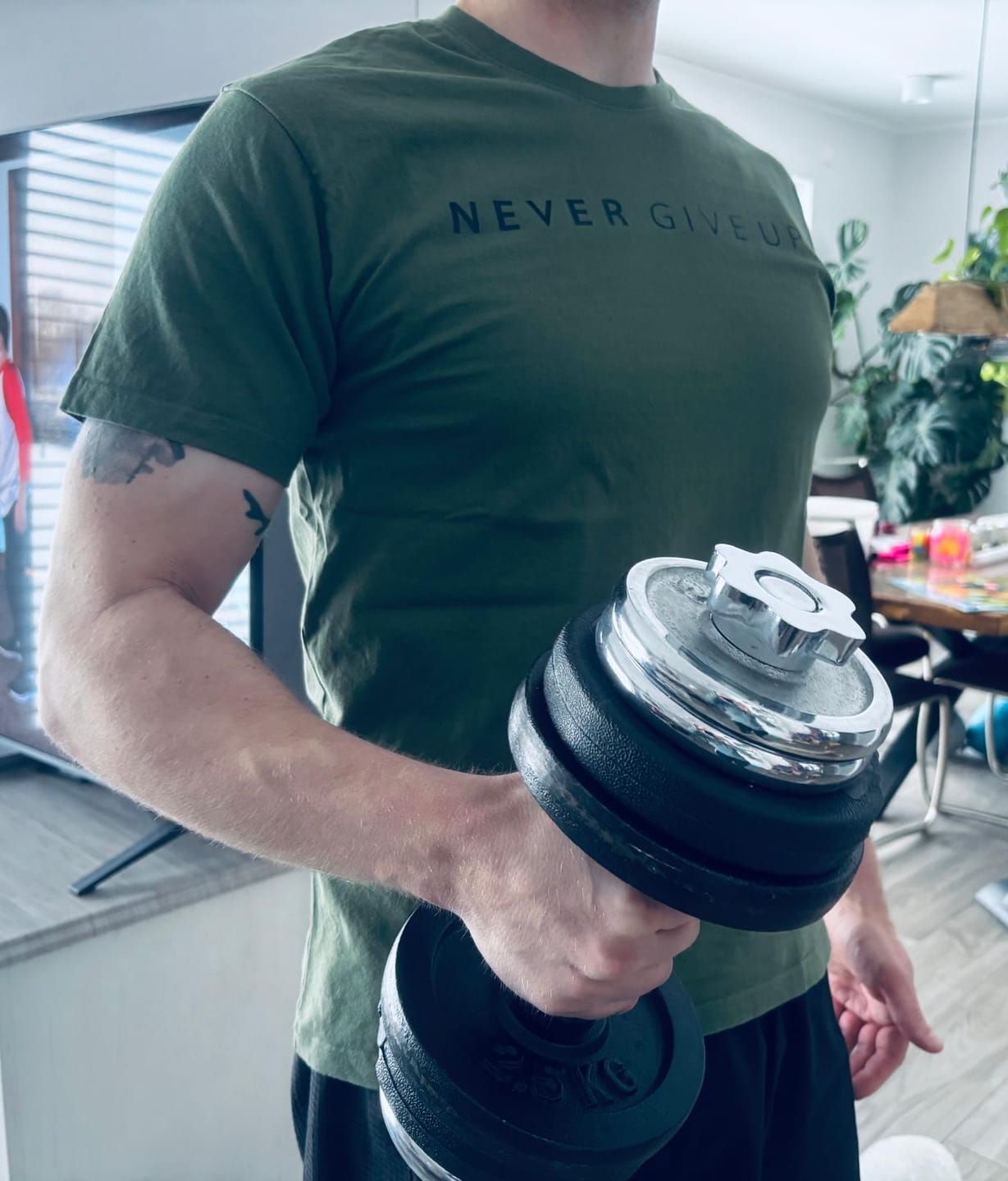 Customer photo review of Never Give Up T-shirt