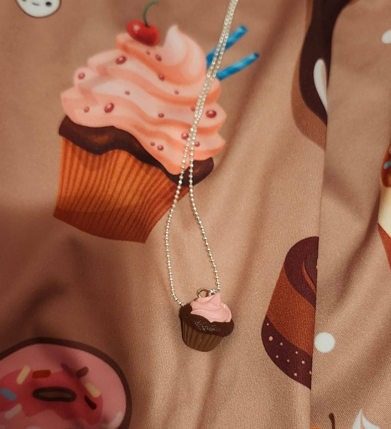 Customer photo review of Scented Strawberry Chocolate Cupcake Necklace