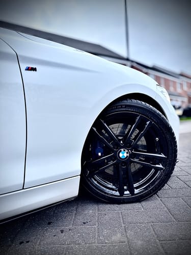 Customer photo review of GLOSS BLACK BMW M FENDER BADGE SET