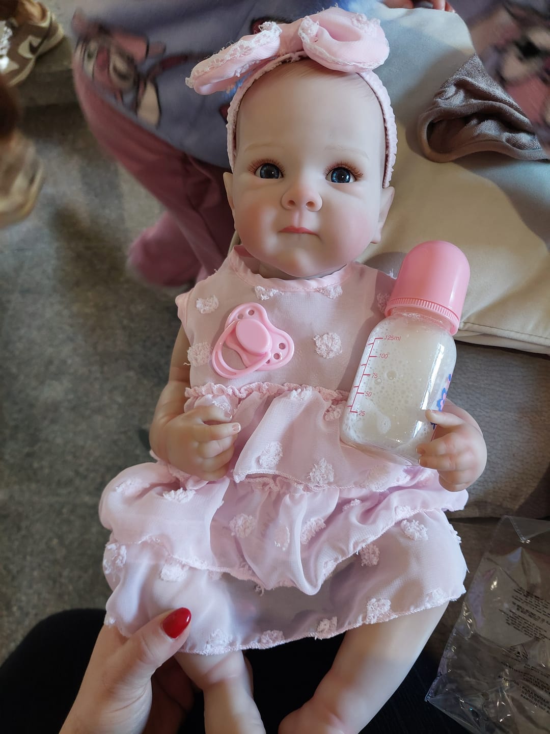 Customer photo review of Bambola reborn full silicone vinile altamente realistica - BETTIE