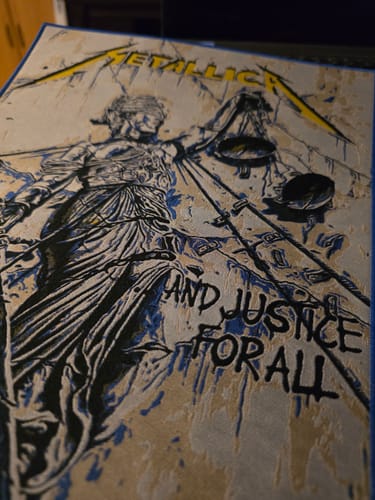 Close-up of the customer's Metallica ...And Justice For All backpatch, showing the detailed artwork from an angle.