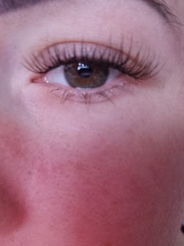 Close-up of a reviewer's eye showing the long, full lashes from the House of Amor DIY Lash Starter Kit.