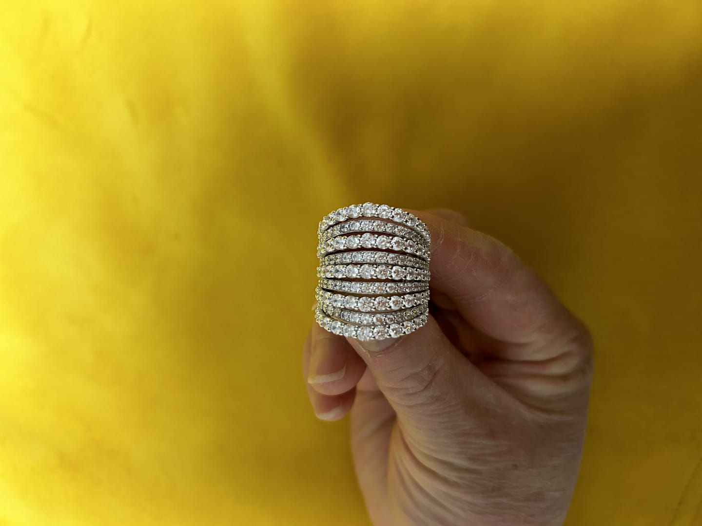 Customer photo review of Dazzling 925 Sterling Silver Pave Round Cut Wide Band Wedding Ring