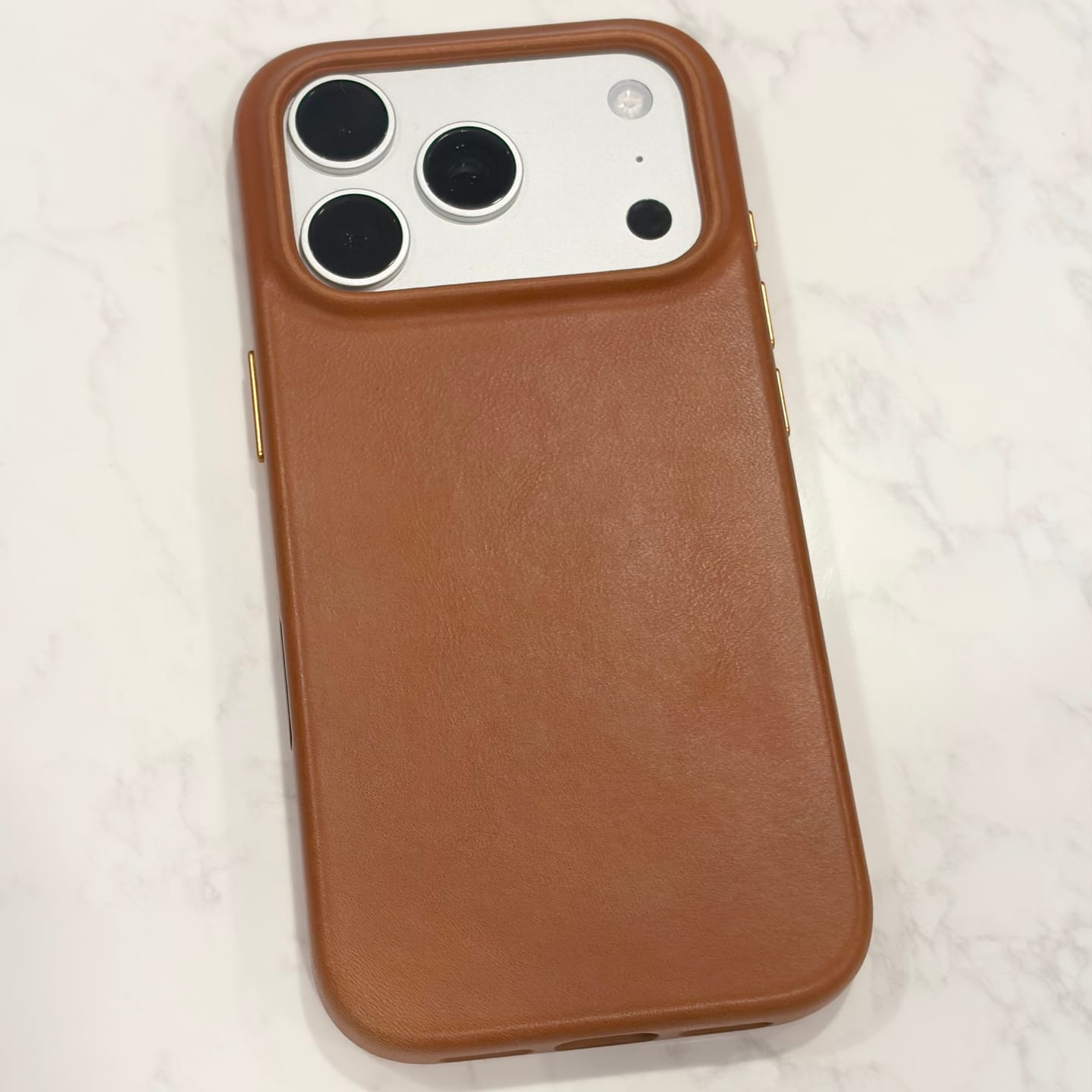 Customer photo review of The Minimalist Full-Grain Leather iPhone 17 Pro MagSafe Case - Saddle Tan