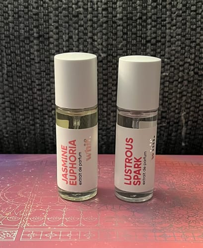 Customer's Mystery Gift, a 10ml bottle of Jasmine Euphoria, shown next to another small perfume bottle.