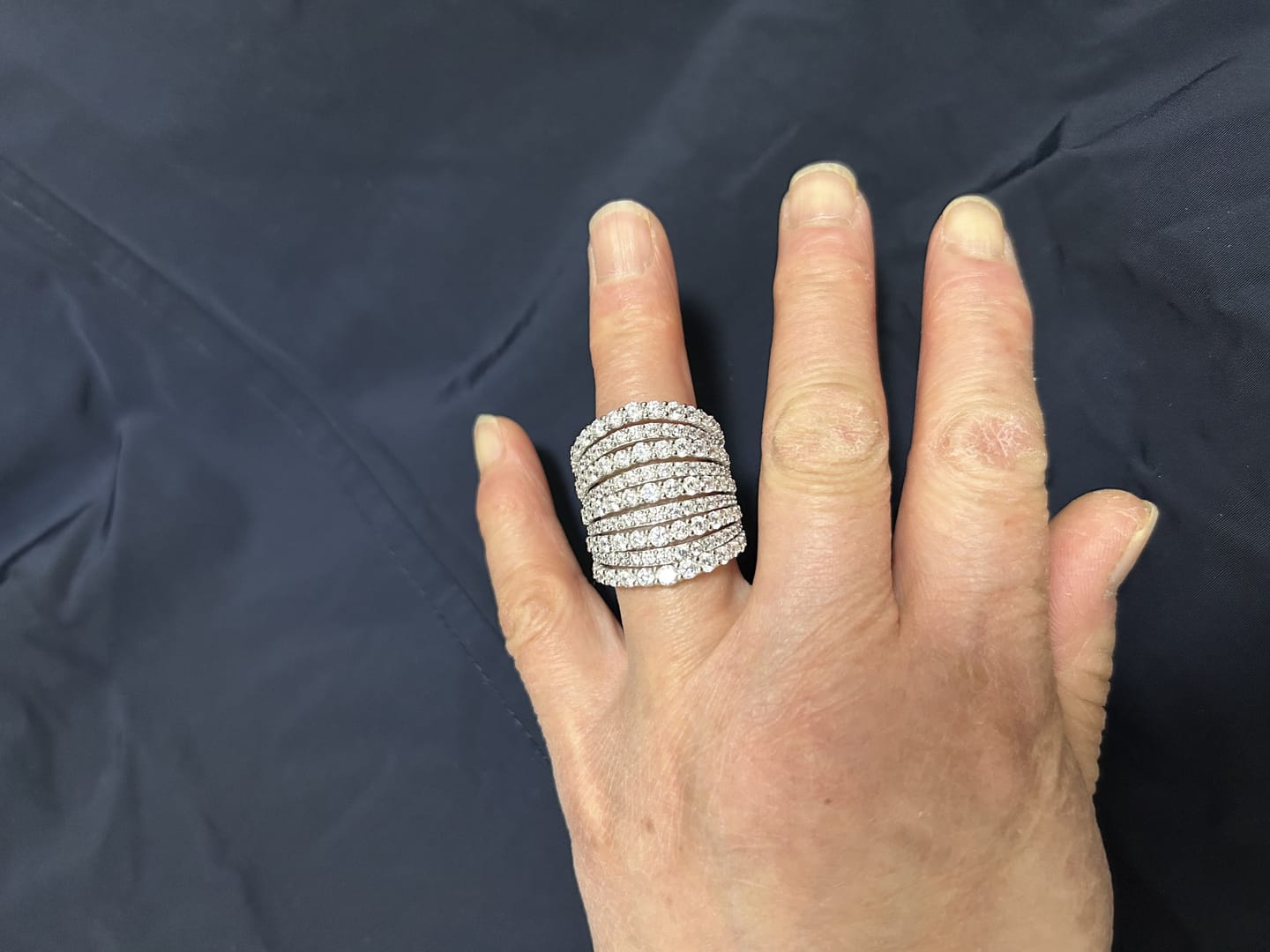 Customer photo review of Dazzling 925 Sterling Silver Pave Round Cut Wide Band Wedding Ring