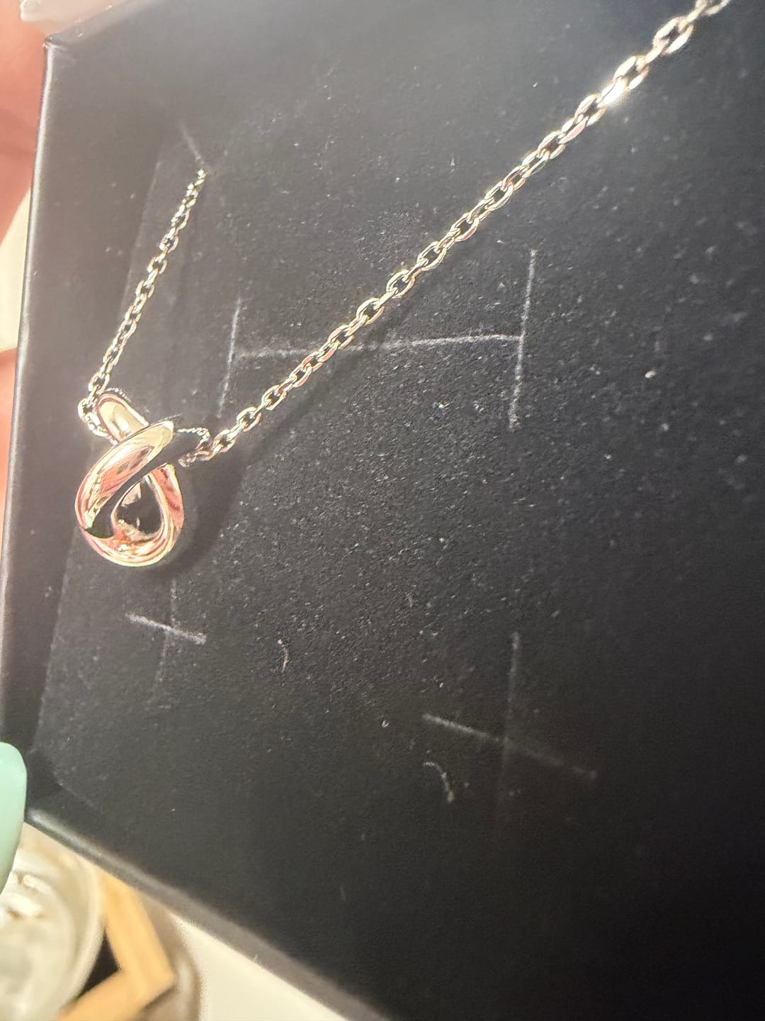 Customer photo review of Ashley 18k White Gold Plated Knot Pendant Necklace